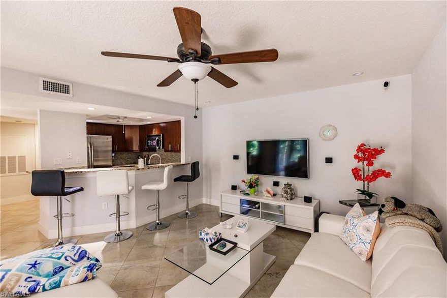 LOCATION, LOCATION!! Furnished & completely renovated is this highly upgraded, 2nd floor condo in The Greens at Fountain Lakes. This stylish condo is MOVE-IN-READY. Fantastic open floor-plan with renovated kitchen that includes: New GE glass cook-top stove/oven, kitchen electrical wiring, contemporary custom cabinetry and hardware. Newer granite counters & back-splash, custom recessed ceiling, light fixtures, GFCI outlets in kitchen, stainless-steel appliances. A/C, on-demand tank-less water heater, and diagonal tile floors. Renovated bathroom with newer granite vanity & custom-tile, and rim-less shower door. Located across from Coconut Point Mall, halfway between Fort Myers and Naples and only a few minutes to RSW airport. Fountain Lakes community offers a 9-hole golf course, 2 swimming pools, 2 tennis courts, shuffleboard courts, exercise room, billiards and more! Perfect location for the water enthusiast, minutes to the Imperial River & Estero Bay with kayak/canoe rental and easy access to world class beaches. Enjoy LOW HOA FEES. NO CDD!! Come see what the Greens at Fountain Lakes has to offer! Welcome home!!