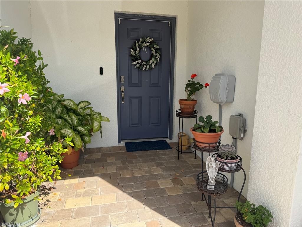 Photo of 15477 Wildflower CIR, NAPLES, FL 34119 (MLS # 226009183)