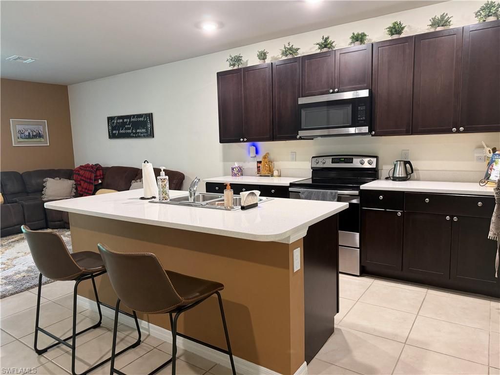 Photo of 15477 Wildflower CIR, NAPLES, FL 34119 (MLS # 226009183)