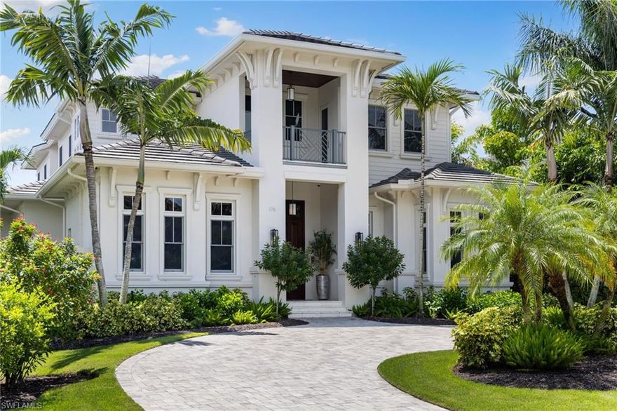 This like-new custom coastal-transitional residence showcases the finest in design, craftsmanship, and livability. Spanning over 7,000 SF with 1,600 SF of outdoor living, the home blends casual elegance with sophisticated detail. European wide-plank oak floors, custom cabinetry, extensive millwork, and tongue-and-groove ceiling treatments set a refined tone throughout. The open floor plan emphasizes indoor–outdoor living, with soaring ceilings and walls of pocketing glass that flow to a resort-style outdoor area complete with pool, spa, fireplace conversation lounge, and a fully equipped summer kitchen. The gourmet kitchen leaves nothing to be desired, featuring floor-to-ceiling custom cabinetry, quartz countertops, a large island, a hidden walk-in pantry, Wolf and Miele appliances, dual wine refrigerators, and a stand-alone ice maker. The first-floor primary suite offers a luxurious bath, his-and-hers walk-in closets, and direct access to the lanai. Upstairs, a loft-style family room, morning kitchen, second laundry, media room, and three en-suite bedrooms all open to a west-facing terrace for sunset views. Additional features include a large study, powder bath, pool bath, oversized three-car garage, Control4 smart home automation, electric roll-down shutters, and lush tropical landscaping. Located in the heart of Olde Naples, this home is within walking distance to the beach, 5th Avenue South, 3rd Street, Crayton Cove, and Cambier Park.