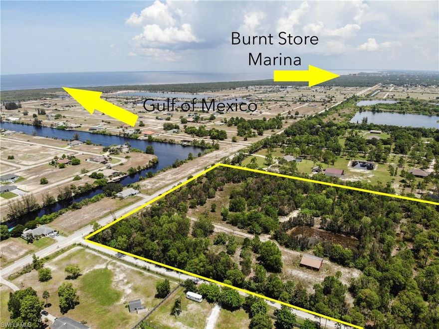 Imagine the possibilities! This lot is just over 9 acres and sits on the corner of a highly desirable up and coming area of Cape Coral. You are minutes from boat ramps, marinas and fishing. This location is equal distance to Punta Gorda, Pine Island and Sanibel Island. You are down the road from Burnt Store Marina! Zoned agricultural with mixed use, enjoy the many benefits that this land offers. The beautiful Longan and Lychee trees line these acres along with mature Oak Trees. There is a horse barn on the property as well as a large man made pond.