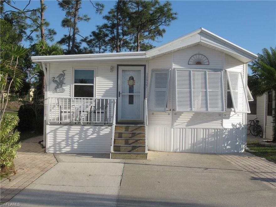 Welcome to the desirable gated community of Corkscrew Woodlands in Estero, known for its natural beauty and peaceful wooded surroundings. This well-maintained 2000 Chariot home sits on a full concrete slab foundation and offers generous storage space underneath the home, perfect for tools, seasonal items, or outdoor equipment.
Enjoy the outdoors from the patio overlooking a wooded view, providing a relaxing setting to enjoy Florida’s natural landscape and outdoor living.
Inside, the home features a convenient second full bathroom that also functions as a laundry area, complete with washer and dryer. An additional refrigerator in the dining area provides extra convenience for guests or entertaining.
This property offers a great combination of functionality, storage, and a tranquil natural setting, making it ideal for seasonal residents or full-time living. Located in Estero with easy access to shopping, dining, and Southwest Florida attractions.