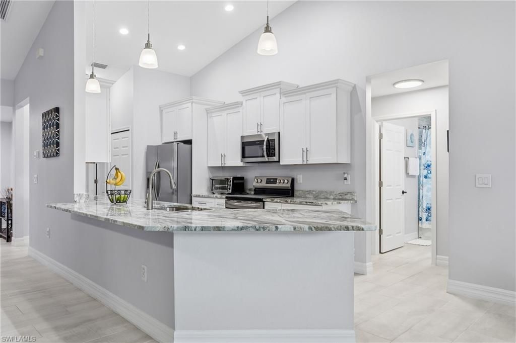 Photo of 2907 18th ST SW, LEHIGH ACRES, FL 33976 (MLS # 226017776)