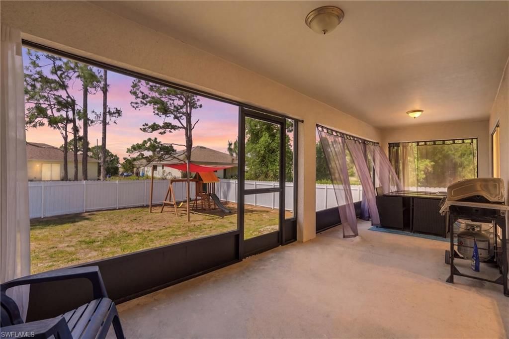 Photo of 2907 18th ST SW, LEHIGH ACRES, FL 33976 (MLS # 226017776)