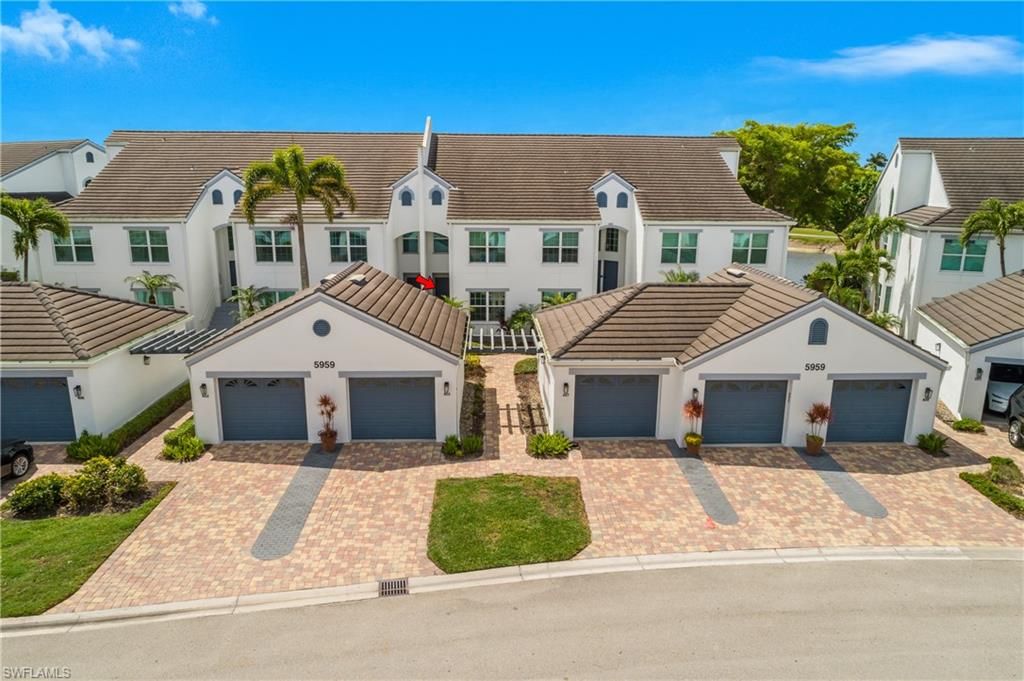 Photo of 5959 Sand Wedge LN #403, NAPLES, FL 34110 (MLS # 226013530)