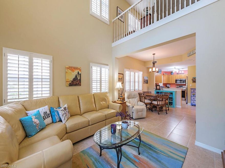 C.16560 Great opportunity to own this meticulously cared for 2 story townhouse with detached garage and extra storage and first floor master suite located in the Bayshore Art District area of Naples less than 3 miles to Old Naples and miles of sandy beach. Beautifully landscaped yard and preserve views from your lanai with a  private setting. 2 guest bedrooms have their own bathrooms and a spacious loft area that can serve as a sitting area or study. High ceilings offer a light and airy feeling throughout. Enhanced with plantation shutters, granite counter tops in kitchen,new washer & dryer, stove and A/C.  The gated community of Botanical place is situated on 20 acres. Convenient to the community fitness center, pool, hot tub and club house.