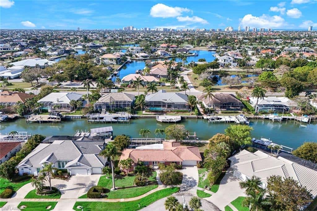 Photo of 358 Grapewood CT, MARCO ISLAND, FL 34145 (MLS # 226027707)