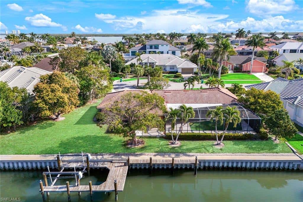 Photo of 358 Grapewood CT, MARCO ISLAND, FL 34145 (MLS # 226027707)