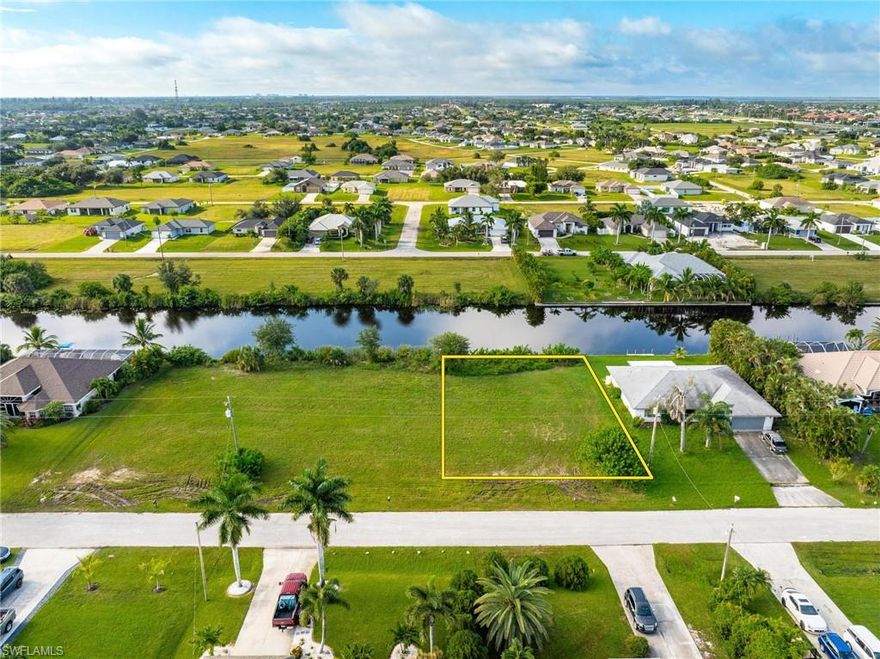 Build Your Dream Home on this Stunning SOUTHERN EXPOSURE WATERFRONT LOT – perfectly Cleared with minimal vegetation, offering Endless Possibilities! This UNIQUE OPPERTUNITY includes the Potential to Purchase the ADJACENT LOT (MLS# 224075570) to create a Larger Estate, add an RV Garage, ample Boat Storage, or Design your Private Oasis complete with a Pool Overlooking the Water, where you can enjoy Breathtaking SWFL SUNSETS!

These Lots boast Over 10 Miles of Freshwater Canals, ideal for Boating, Fishing, and Kayaking. Enjoy the serene lifestyle of Walking and Biking in this peaceful community or take a short drive over to the local CORAL OAKS GOLF COURSE! Nestled in a quiet, friendly neighborhood with New Construction Homes, this Prime Location is conveniently Close to Local Amenities such as the Northwest Regional Library, Grocery Stores, Gas Stations, and Schools like Mariner Middle and Mariner High, all just a short distance away.

With Easy Access to Pine Island Rd, Burnt Store Rd, and nearby Punta Gorda, you're Minutes from Dining, Shopping, and Entertainment. Additionally, the Charming Waterfront Community of MATLACHA is just a few minutes away, offering unique Dining and Shopping Experiences.

This Location is NOT currently planned for City Water and Sewer, and NO Assessments are due! The Lot is affordably priced with its Unique Opportunity compared to other city locations. Don’t miss this chance to secure your Piece of Paradise and Live where others Vacation!