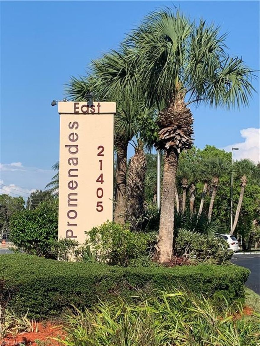 Don't miss out on this desirable open floor plan Promenades East end unit that is turn key and very close to restaurants, shopping, medical offices and hospitals! Conveniently located nearest to the elevator and away from the other condos for added privacy. The inviting spacious entry way has added closets for additional storage and is separated from the living space. Relax and enjoy in the large furnished living room that is open to the furnished dining room and kitchen. Enter the lanai with closet from the living room or bedroom to enjoy the Florida sun or an afternoon rain. The bathroom is easily assessable from the kitchen and the large bedroom and has separate laundry space and more storage! Beautiful laminate flooring throughout most of this lovely home that also has easy to close hurricane shutters on the lanai! The clubhouse has a full kitchen and the community pool is Olympic sized! Bring your suitcase and start loving condo life!