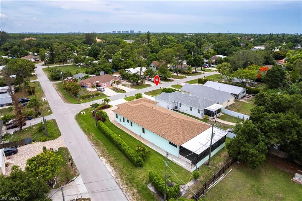 Photo of 10295 Carolina ST, BONITA SPRINGS, FL 34135 (MLS # 226004851)