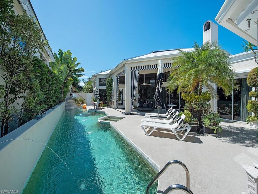 V.3051 - Welcome to Grand Bay in Pelican Bay and a very special property located in a community of only 33 Villa  homes. . As your enter your front door into a spacious courtyard you encounter a 52 foot full lap pool and cabana to your left that includes one bedroom and one full bath , plus a half bath behind the cabana . As you enter the main villa with 13.6 ft ceilings you will realize you are in a special place. Three bedrooms plus three full baths and one half bath will greet you . Very bright kitchen area with eat in space and family room including working fireplace. The great room offers a lot of space and as you enter the master bedroom you will find a luxurious  space that will rival the finest cruise ships with marble floors and solid glass doors. The main living area is covered in cross cut travertine and offers a nice view of the lake . Two car air conditioned garage completes this property. Grand Bay is secure and offers extremely low density in a world class community...
A new roof is being installed on the property at this time.