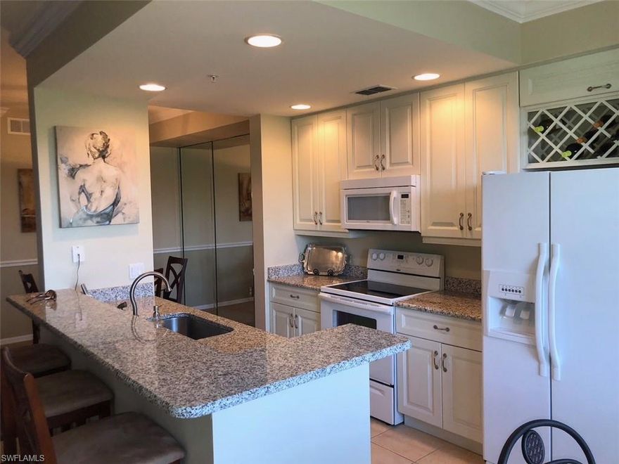 C.15379 Model perfect! This “Bougainvillea” floor plan is beautifully updated with new kitchen cabinets,granite countertops, new dishwasher and kitchen sink. The bathrooms are also updated with new granite countertops and cabinetry. Other updates and improvements include crown molding, chair rail and wine rack. The condo has also been recently painted and comes FURNISHED.Conveniently located on the first floor overlooking the 17th green with wide open golf course and lake views. On the East side of Cypress Trace looking West with no traffic noise. Cypress Woods is a bundled golf community with a new clubhouse including a great restaurant and bar, tennis courts, fitness center and community pool.Cypress Trace also has its own satellite pools for convenience. A must see!!