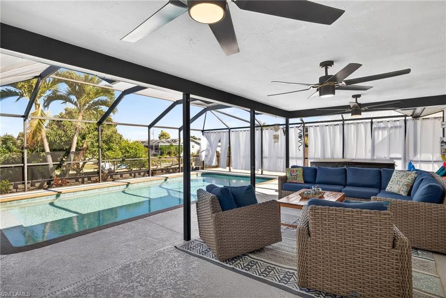 Experience the ultimate Southwest Florida lifestyle in this beautifully renovated 3-bedroom, 3-bath Gulf access home in desirable Cape Coral. Perfectly designed for both relaxation and entertainment, this waterfront retreat offers direct boating access to open water, making it a dream property for boaters, anglers, and sunset lovers alike.

Step outside to your private tropical oasis where true Florida living comes to life. A composite dock with boat lift provides quick, convenient access to the Gulf, while the expansive outdoor living area invites you to unwind or host unforgettable gatherings. Enjoy a fully equipped outdoor kitchen, a charming tiki bar, and a sparkling pool and spa surrounded by lush landscaping — the ideal setting for morning coffee, afternoon swims, and evening cocktails under the stars.

Inside, the home has been thoughtfully renovated with modern finishes, offering a bright, open layout that blends comfort and style. Major improvements provide peace of mind, including a new roof, updated plumbing, and new HVAC system. Even better, the property has never experienced flooding and is not located in a flood zone, adding an extra layer of security and value.

This home is not only a personal paradise but also a proven income producer. It is currently enrolled in a successful rental program with bookings secured into 2027, making it an exceptional opportunity for investors seeking immediate returns or buyers looking for a flexible vacation home that helps offset ownership costs.

Whether you’re cruising the waterways, entertaining poolside, or enjoying the steady stream of rental income, this Gulf access gem delivers the perfect blend of lifestyle, location, and investment potential. This is waterfront living at its finest — move-in ready and waiting for you.