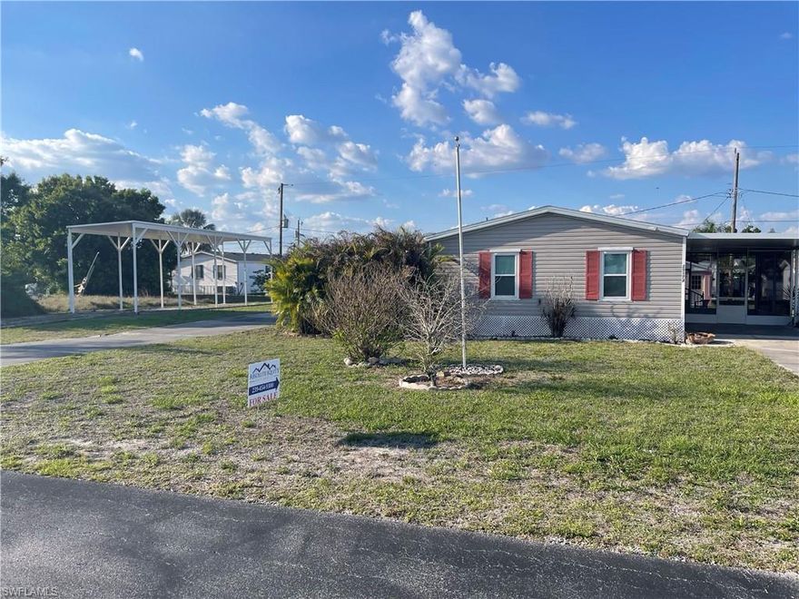 Great Mobile home in desirable area. Welcome to your dream home in the peaceful and serene Peace River Association community! This beautiful manufactured home boasts 2 bedrooms, 2 bathrooms, and a spacious 2 car garage. The community pool is perfect for relaxing and enjoying the warm Florida weather. The kitchen features elegant Formica counters and white appliances, creating a modern and inviting space for cooking and entertaining. The cozy carpet throughout the home adds a touch of comfort and warmth. This 55 plus community offers a tranquil and welcoming atmosphere, perfect for those looking to enjoy their retirement years in style. The property is situated on two lots, providing ample space and privacy. Covered RV parking, a two-car garage, and a carport offer plenty of room for all your vehicles and outdoor toys. The skylight in the kitchen fills the space with natural light, creating a bright and airy ambiance. The convenient laundry room adds to the functionality of this lovely home. With a public golf course nearby, you'll have plenty of opportunities to enjoy the great outdoors and stay active. Don't miss out on this fantastic opportunity to own a piece of paradise in Peace River Association!