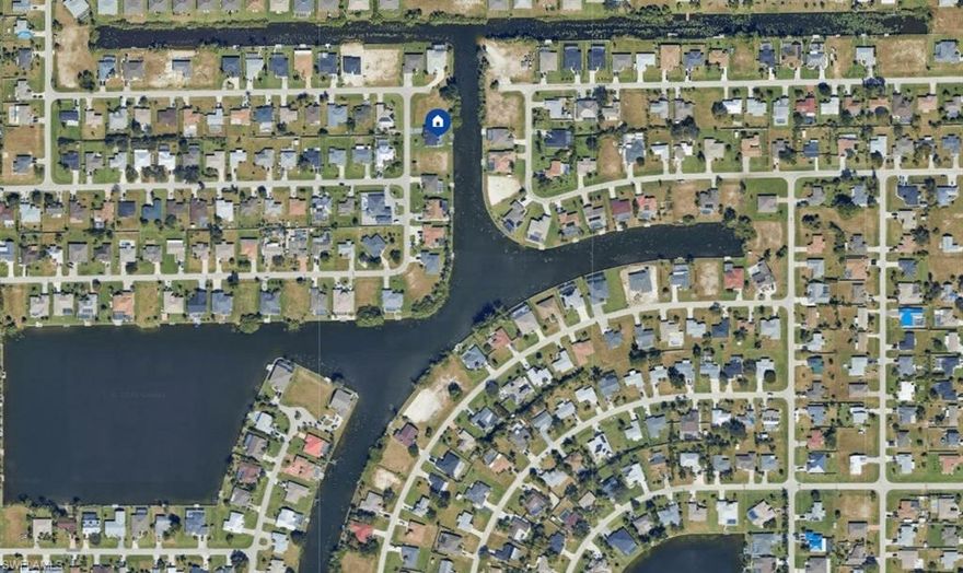 Build your dream home on this oversized, navigable waterfront lot tucked away at the end of a quiet street, offering added privacy and a peaceful setting. With direct access to navigable waterways, this property is ideal for boating, kayaking, and fishing right from your backyard. It's perfect for enjoying the Southwest Florida lifestyle. Located in a desirable Northeast Cape Coral neighborhood, this lot provides convenient access to everything SW Florida is known for. Spend your days boating through Cape Coral’s extensive canal system, exploring nearby Pine Island and Matlacha, or heading out to the Gulf beaches of Sanibel and Fort Myers Beach. Enjoy world-class fishing, waterfront dining, championship golf courses, nature preserves, parks, shopping, and entertainment just minutes away. Whether you’re building a primary residence, a vacation retreat, or an investment property, this waterfront lot offers space, location, and lifestyle - an excellent opportunity to create your own slice of paradise in Southwest Florida.