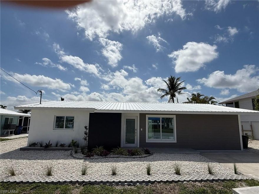 THIS RESIDENCE HAS BEEN REMODELED FROM THE SLAB TO THE ROOF! THREE MASTER SUITS!!! NEW INTERIOR: NEW DRYWALL / PAINTED AND TEXTURED, NEW KITCHEN CABINETS AND VANITIES, NEW QUARTZ COUNTER TOPS, NEW KITCHEN / BATH PLUMBING AND FIXTURES, SS FARM SINK, SS LG APPLIANCES: RANGE/CONVECTION OVEN, MICROWAVE, DISHWASHER, 25c/f REFRIGERATOR/W ICEMAKER, DISPOSAL, 2 LAZY SUSANS AND 6 DOOR PANTRY, FULL SIZE WASHER AND DRYER, HWH, ALL TILE BATHS WITH LIGHTED MIRRORS, FLOATED VANITIES, 3 CEILING FANS, NEW 200 AMP ELECTRIC SERVICE PANEL, NEW CENTRAL AIR / INSULATION IMPACT WINDOWS / DOORS, METAL ROOF, PAINTED STUCCO EXTERIOR, NEW LANDSCAPING AND RIVER ROCK, COMPOSITE DOCL WITH 10k LB. BOAT LIFT / H2O/ELECTRIC @ DOCK, LOCATION! LOCATION! LOCATION! 5 minutes for 2 Publix shopping centers with gas, banks, restaurants, shops, ride your bike or take your boat to the shops and restaurants of Matlacha, NO HOA FEES! MINUTES TO THE BEACHES SANIBEL AND BOCA GRANDE TARPON WATERS! NO ISSUES WITH LOW TIDE WATER LEVELS, BEST VALUE ON THE WATER!!!