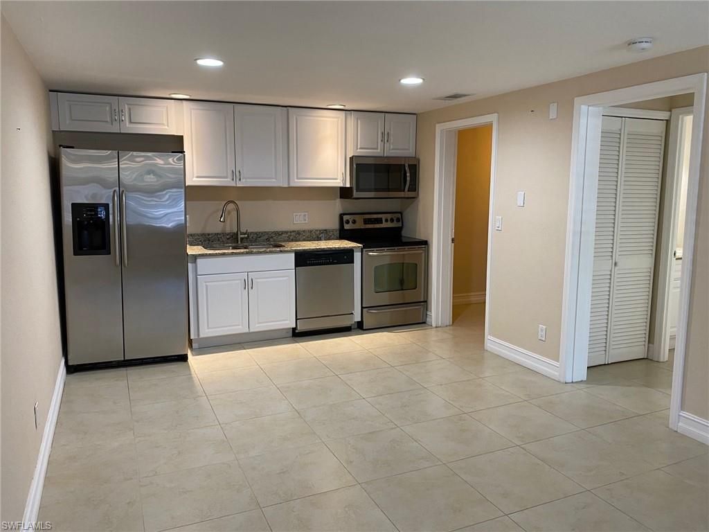 Photo of 5389 Treetops DR, NAPLES, FL 34113 (MLS # 226012098)