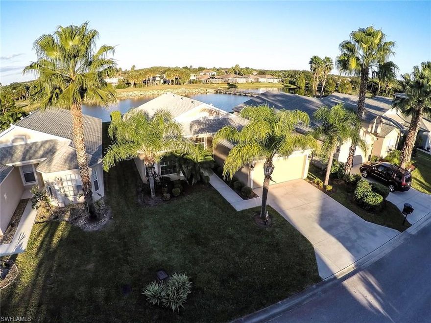 Beautifully updated 3 bedroom, 2 bath Augusta floor plan with tile throughout including 2 of the bedrooms.  Lakefront pool home with private hedges that run down both sides of the property, outdoor bar area with sink.  Kitchen features granite counters, stainless appliances, wood cabinets and large pantry.  Plantation shutters on all windows and sliding glass doors.  Vaulted ceilings in main living area.  Large master bedroom with attached bath has a walk in closet, separate tub and shower and dual sinks.  Enjoy the views of the lake and golf course without the golfers being in your back yard!  Stoneybrook amenities offer something for everyone!  Exercise room, tennis courts, pickleball, volleyball, basketball, in-line skating rink, bocce ball and baseball field!  The golf course is public so you can pay when you play.  Conveniently located close to shopping, dining, interstate, beaches, university and airport.  Short walk to golf course clubhouse, CVS, Publix, Miromar mall and Germain arena.  15 minutes from airport baggage claim.  Low association fees and great amenities make Stoneybrook a popular choice!