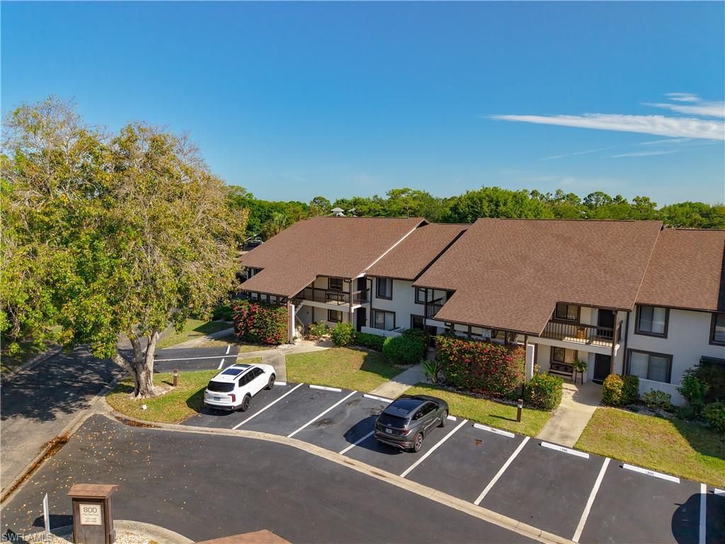 Photo of 800 MISTY PINES CIR #202, NAPLES, FL 34105 (MLS # 226015236)