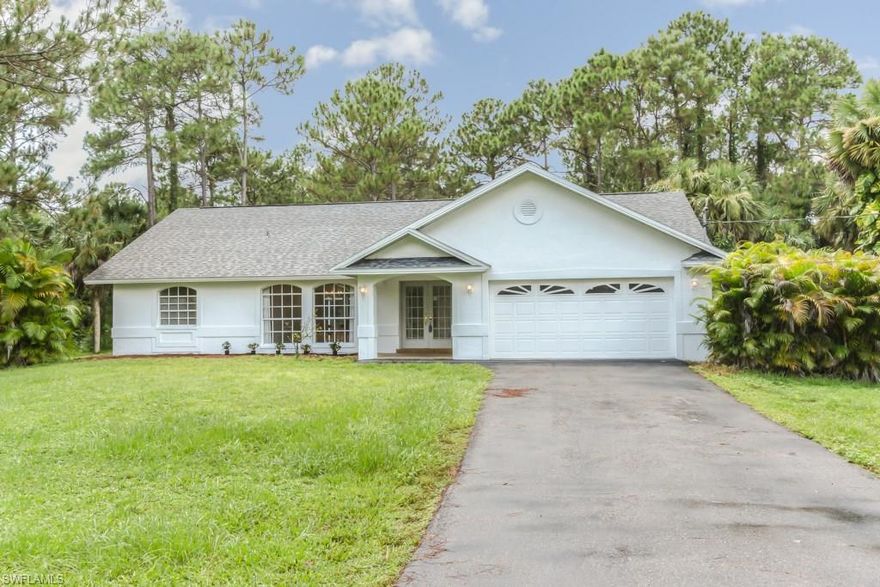 Light and Bright Pool home on 2.5 acres. Priced to sell and with the option to purchase the 2.5 acre land directly next door to this property also (price upon request). 3 BR, 2.5 bath home, great open floor plan, pass through from kitchen to lanai is great for entertaining.  Large lanai with wonderful pool is perfect for relaxing!  Home is sold "as is" and ready for you to put your touches on it and make it your perfect piece of paradise. Lot is mostly cleared and has been recently painted on the outside, driveway is paved and roof was replace in 2011. Golf cart and furniture in the home are available.