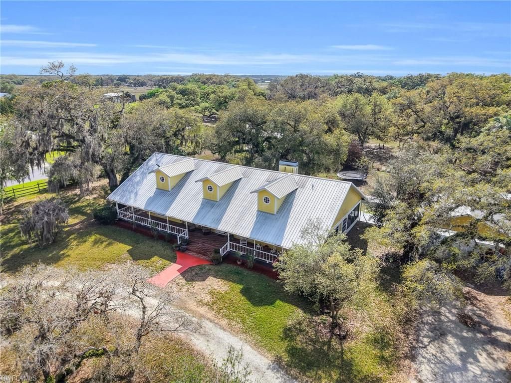 Photo of 1712 Frontier CIR, LABELLE, FL 33935 (MLS # 226011917)