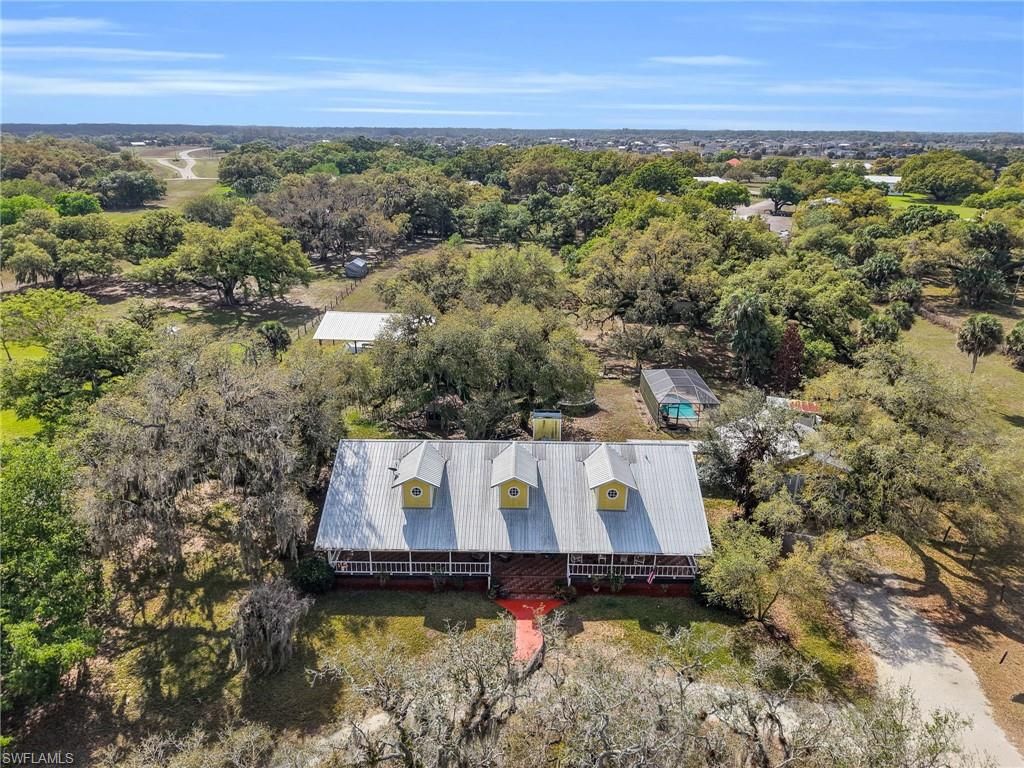 Photo of 1712 Frontier CIR, LABELLE, FL 33935 (MLS # 226011917)