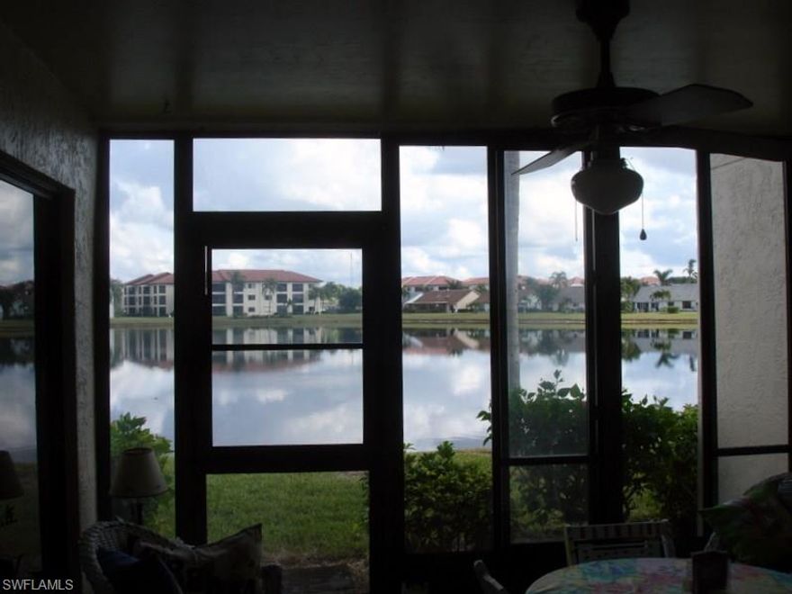 Royal Palm lake front condo with beautiful views. Florida room has been enclosed with acrylic sliders to be used in any weather. Kitchen cabinets refaced in 2015.  Nice large tile flooring 2015.  Unit to be sold partially furnished without pictures (painted by owner). Across the street from Bayleaf pool.  Full time actives with director.  Low fees of $320 per month.  Taxes approximate $2,300 or with homestead $1,700.