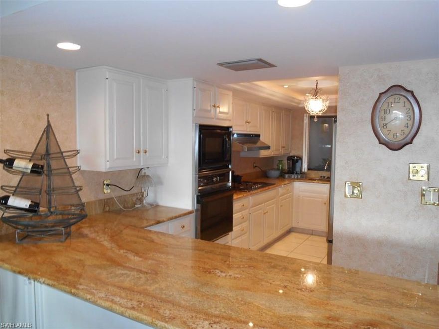 Enjoy the sweeping views of the Caloosahatchee River from the 8th floor of this stylish condo.  Spectacular sunsets await you as you enjoy an evening cocktail or bask in the coolness of the mooring as you enjoy our breakfast overlooking the river in your private lanai.  The kitchen has been upgraded with upscale granite, crown molding in the great room, custom mirrors, a large master bedroom and huge master bath.  The bathroom was remodeled with a jetted and heated air tub plus a custom shower with 4 side jets for a spa like experience.  The window coverings are remote controlled so you can relax in your ez chair and just adjust the custom drapery's to suit your needs.  The Ariel condo has it own under building parking, tennis courts, swimming pool with a large deck area and several gas grills to use, a fitness center, game area, library and several meeting areas. It also has an onsite management office to take care of the owners.  If you are looking for a gated community with with boating, tennis, golf, river front dinning and locate close to shopping, beaches, restaurants, entertainment and so much more, then is the the community for YOU!