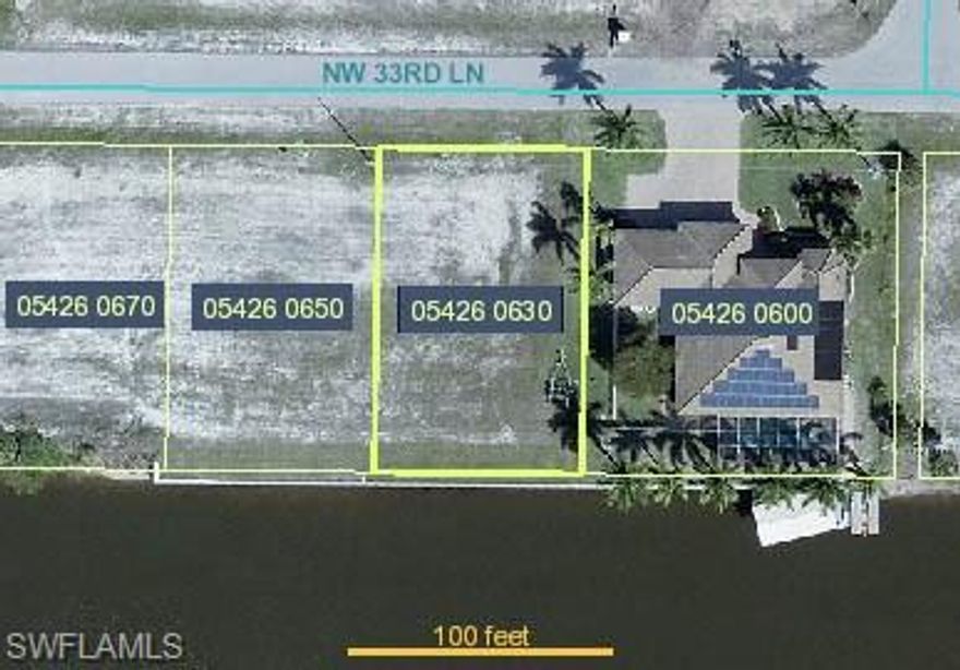 Southern Exposure! Gulf Access Lot with Seawall already in place! Beautiful Homes on both sides.  Ready for your Brand New Home! 250' Wide Canal!
