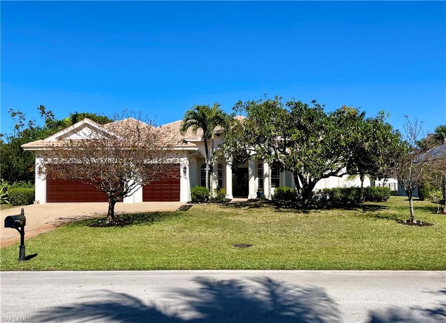 HIGH and DRY .33 acre lot. Not in a flood zone. Single story living at its best. Double trey cathedral ceilings, crown molding. Open Lanai. Oversized 3 car garage with room for your car collection, new street legal golf cart plus beach gear! CBS with hurricane protection home has been recently refreshed with all new exterior and interior paint, new exterior & interior lighting and hardware. Brand new LG appliance package with double wall oven, newly refinished kitchen cabinetry, new carpeting. Wood flooring in den. Ample sf for a large family with formal dining area, great room, large kitchen with island. Massive master suite and sitting area.  Large master bath. Brand new landscaping has been lovingly added to compliment the mature foliage. 7 amazing mango trees, yielding what some might say are the best mangos in town. Yard has the perfect setting for a large pool. Clusia hedge for privacy. 5th Avenue North is lined with canopied Royal Poinciana trees. 6 blocks to beach and short stroll to 5th Avenue S, dining, city dock, NCH Wellness Center and hospital.  A stone’s throw to new Four Seasons Resort.  Friendly faces and a super happy vibe community. Spotless. Move-in ready!