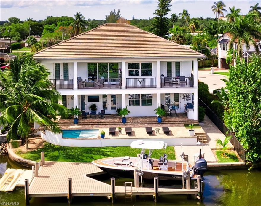 This is the custom luxury waterfront estate you’ve been searching for!
Privately situated on a riverfront pointe lot, 1 mile to downtown Naples with easy access (by land or water) to fine dining and shopping.
Built in 2019, at almost 3,800 sq/ft, this gorgeous home features 5 spacious bedrooms and 5 luxurious baths.
Once inside you’ll experience a showpiece staircase, beautiful open floor plan, a designer kitchen with massive storage, walk in pantry, and spectacular views from every angle!
This home boasts over 2,000 sqft of elegant outdoor living area including a beautiful custom pool with 2 waterfall features, breathtaking views of our Naples sunsets as well as expansive views of the river. 
Ideal for entertaining or a quick ride by boat to the Gulf of Mexico. 
Additional Amenities include: 12’ ceilings, all LED lighting fixtures, and plantation shutters throughout.  Pre-constructed for a private elevator, impact windows and doors, no shutters needed but pre-wired at 1st and 2nd floor covered lanai areas for screens, shutters or both, also includes a 40’ x 22’ composite dock with 10,000# boat lift.