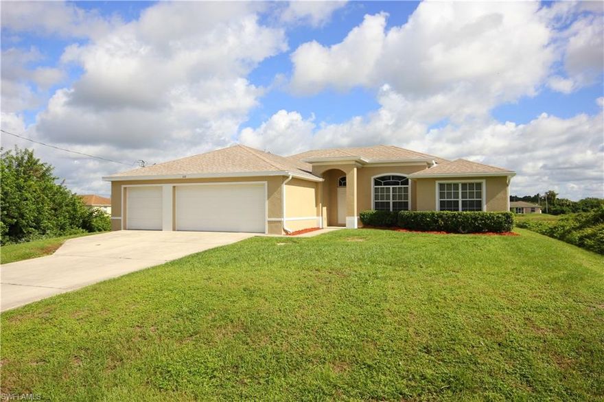 **Back on the market after IRMA!** This is as close to a brand new home as it gets and even comes with a home warranty! 4 bedrooms, 3 baths and a den that could easily be used as a 5th bedroom just start to describe this HUGE open concept floorplan! Among many other updates, this home boasts complete fresh paint inside and outside, updated landscaping, brand new tile throughout the entire layout, corian counter tops, wood cabinets, stainless steel appliances, a large walk in pantry, dedicated laundry room and a oversized three-car garage! The master bedroom suite is on a whole new level with two closets, two separate vanities with sinks, water closet, a walk-in shower and a large soaking tub. Right outside the sliding doors sits a screened lanai that overlooks the back yard with plenty of room for a pool to enjoy the Florida summers. Situated in a very convenient location as the last house on a dead end road with quick access to Fort Myers, schools, restaurants and more! Sellers also have a home inspection from Kross Inspectors showing negative for defective drywall. Beautiful SW location and it will go fast, call today on this stellar home!
