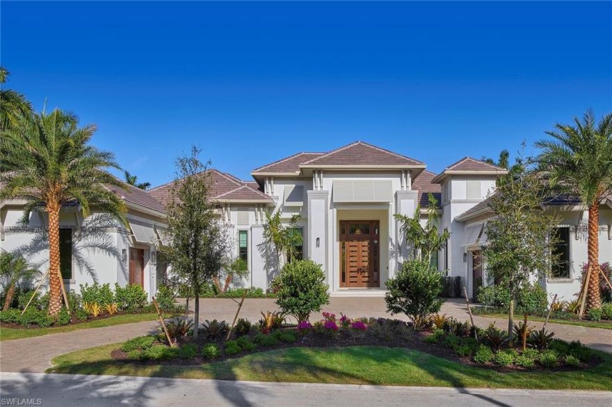 The recently completed fully furnished Stockton estate model by Stock Custom Homes resides in the exclusive Estates neighborhood in Estuary at Grey Oaks. This custom model home completed in 2020 was conceived by RG Designs along with SOCO Interiors and is located on a picturesque 0.65-acre homesite with private golf and preserve views through nearly every room. The four bedroom plus study, four and two half bath model has soaring ceilings and a spacious open concept floor plan that exudes quality throughout. The custom gourmet kitchen with top of the line Wolf and Sub-Zero appliances has a generous quartz island with dual dishwashers. This home is perfect for entertaining family and friends and has a spacious butler’s pantry, bar, open see-through glass climate controlled wine room and a dining room with French doors overlooking the pool area. The outdoor living space takes full advantage of the Naples indoor /outdoor lifestyle with a custom designed pool and 360-degree spillover spa, gas fireplace, outdoor fire pit, all enclosed with hurricane shutters and motorized screens at the touch of a button. A world of luxury awaits you in the private country club community of Grey Oaks.