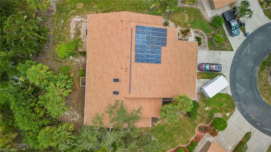 Priced to sell – an excellent investor or handyman opportunity! This partially restored unit offers a head start on renovations with neutral finishes that complement any décor. Located in the 55+ section of Island Park Village, the home features vaulted ceilings, skylights, and a private wooded view that adds a sense of peace and privacy. The kitchen was updated prior to Hurricane Ian, with upper cabinets in like-new condition. Additional upgrades include modern ceiling fans, custom closets, and leaf filter gutter protection. The roof was replaced in 2022, offering added value and peace of mind. Island Park Village is a vibrant, amenity-rich community featuring a pool, tennis, pickleball, shuffleboard, and an exercise room. With a bit of vision and finishing work, this property can truly shine. Don’t miss the chance to transform this unit into a comfortable retreat or smart investment in a well-established community.