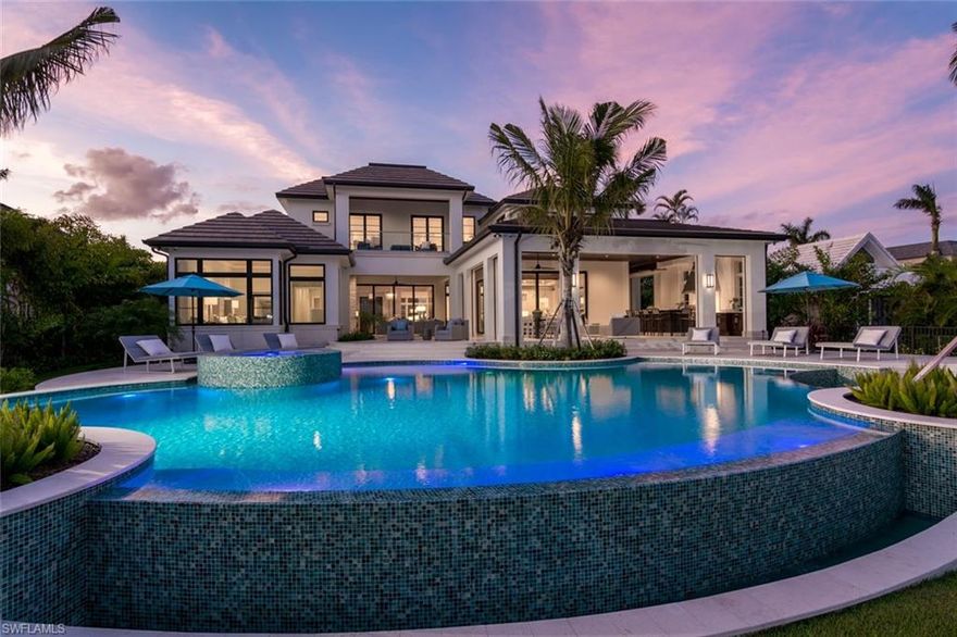 JUST COMPLETED NOVEMBER 2017. The Pirate's Walk. From the artisans that brought you 3510 Fort Charles Drive comes a phenomenal new Bermudian style retreat in Port Royal completed by heralded Meridith Baer. Meticulously designed by Jon Kukk, this enchanting home sits on an oversized lot with ideal southern exposure for all day sun. Quick access to Naples Bay and the Gulf from Harbour Head makes this a sportsmans home. The open and inviting floor plan will flow seamlessly to the outdoor living area and the over-the-top resort- style pool and spa with semi circle seating with fire pit. 5 full bedrooms, 6 full baths and 1 half bath have been expertly designed for maximum enjoyment. The master suite will boast beautiful space with natural light and completed by the custom oversized closets. The interiors such as the wide plank DuChateau wood floors, chef’s style kitchen and upgrades throughout  thoughtfully assembled by Lisa Kahn Design Group, one of Naples’ finest designers. Christian Andrea has created an inviting serpentine entry and enchanting curb appeal thru the mix of landscapes and hardscapes. Immediate Port Royal Club eligibility for one of Naples' ultimate new luxury retreats.