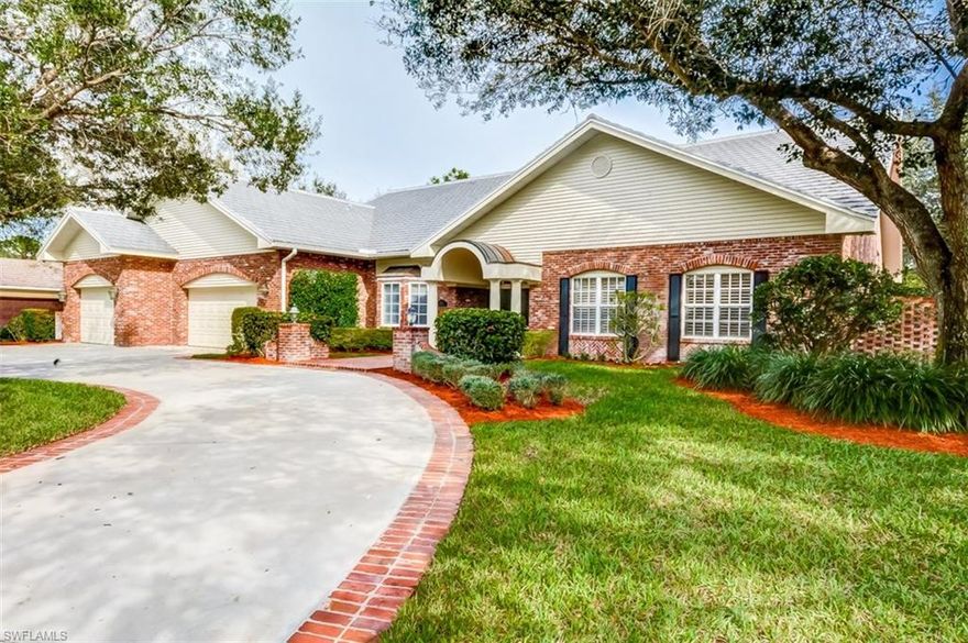 As soon as you approach this home you instantly feel the character. Built from brick reclaimed from "Union School" Alabama built in 1928 this home has character everywhere.  As you walk through the front door you are greeted by Arizona flagstone floors and an open airy space, featuring a staircase to the upstairs recreation room.  This room used currently as a rec room could easily be turned into a state of the art home cinema. Enjoy the large open outdoor living space for entertaining or just relaxing by the gas heated pool and spa. The outdoor kitchen is fully outfitted with gas grill, refrigerator, burner, sink and plenty of space to eat. With a large master suite, guest suite, 2 bedrooms, den and 3 car garage this home is truly a gem. This home also has a new roof replaced in 2015! Located in a small private gated community of only 41 custom homes with over 1/2 acre lots and only 3.5 miles to the beach, this is one of Naples best kept secrets. Take a tour today!