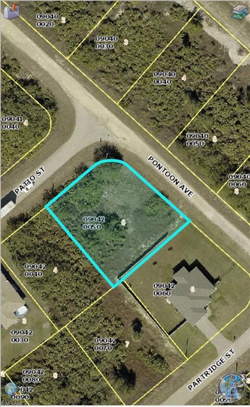 Large residential corner lot for sale.