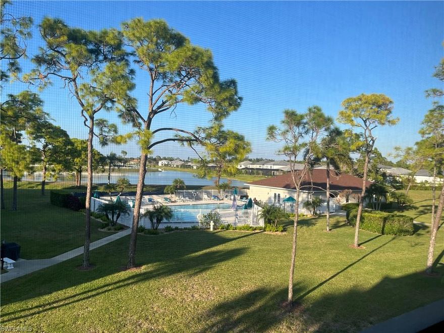 Welcome to a slice of the good life at Bonita Pines Club!  Top floor (3rd level) Condominium Home has two bedrooms, two baths, one carport, elevator access and an exceptional view right outside the screened in lanai! New interior paint & ceiling fans 2025, vinyl flooring throughout, updated kitchen, and Quartz countertops in 2022. A/C installed in 2020. Bonita Pines Club offers their residence a peaceful community with Club House, swimming pool, pickleball, tennis courts, basketball, barbecue areas, mature landscape and space to just breath. Downtown Bonita Springs is just a short distance away. You will be located near a variety of shops, restaurants, and entertainment. RSW is less than 20 miles from the Community, and best of all, you are only 7 miles away from some of the most beautiful beaches on the Gulf Coast! Now is the time to live your best life! Seller is Motivated, all reasonable offers will be considered. We look forward to hearing from you! Thank you!