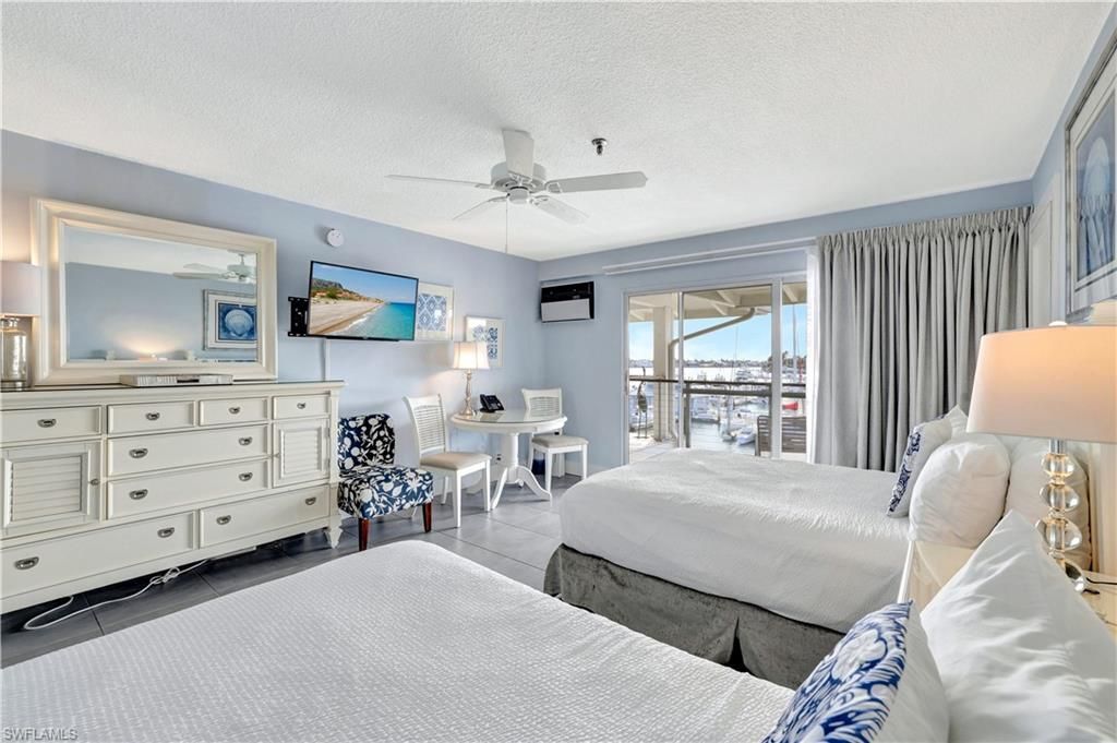 Photo of 900 Broad AVE S #320, NAPLES, FL 34102 (MLS # 225056217)