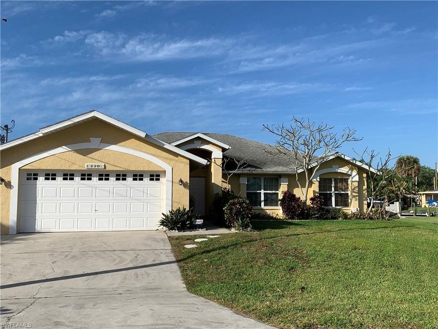 Outstanding Investment Opportunity! Sailboat Access Pool Home. It is a Boater's Paradise just being out to the Caloosahatchee River within minutes.  You will love 160' of seawall and the boathouse.  Built in 1992 with over 1700 sq. ft. It boasts a Large Living Room, 3 bedrooms and 2 bathrooms. The garage is oversized at 23 ft. long.  It's located at the end of the Cul-de-sac. This home has incredible potential with some updating. Come look at it today as it will not last long!