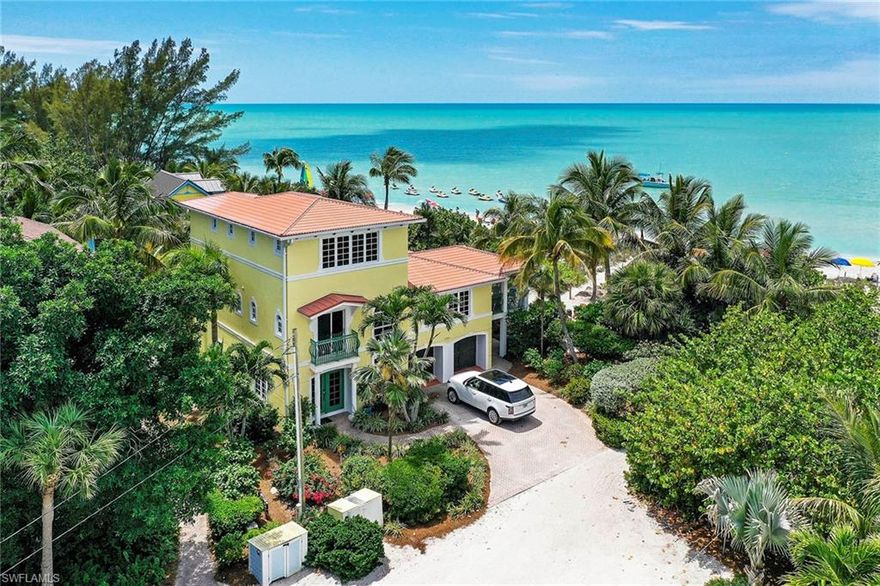 Welcome to "BEACH DESTINY" located in the Heart of Captiva Village & only steps away from The Gulf Of Mexico! Here's your chance to own your very own Private Beach Front Resort. This Spectacular Home boast 5 Beds/5.5 Baths, 2-Car Garage & is Designed to enjoy the Captiva Lifestyle. First Level has a Lovely Entry Foyer & 2 Guest Suites/Baths. On the 2nd Level you'll find a Spacious Family Room, Well Equipped Kitchen with Custom Cabinetry, Large Island, Granite Counters, SS Appliances & Walk-in Pantry. Two Additional Guest Suites/Baths plus a Fantastic Covered Balcony completes this space. Top Floor is reserved for the Owner's Retreat & features Sitting Area, Fire Place, Sumptuous Bathroom with Jacuzzi Tub overlooking the Gulf. Outside enjoy Cocktails at the Tiki Bar & Fire Pit, Relax as you watch our Incredible SWFL Sunsets from your very Own Private Beach! There's even an Outdoor Shower to freshen up after a long day soaking up the Sun. Several Local Restaurants & Shops are within easy walking distance, enjoy nightly entertainment. Home is in a very Successful Vacation Rental Program & grosses almost $300,000 annually for owner. Hurry, don't wait you just can't beat this Location!