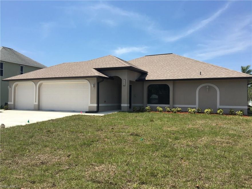 BEAUTIFUL brand new POOL home in highly desirable area of Southwest Cape Coral. 4 bed, 2 bath, 3-car garage. 1718 sq. ft. Tile everywhere excepts bedrooms. Granite countertops throughout. Beautiful stainless steel appliance package. EXTRA-LARGE screened lanai with decorative pavers. Pool bathroom. Cathedral ceiling in living area. Tray ceiling in master with 2 walk in closets and a master bath that features a large tiled shower and dual sinks. Automatic sprinkler system. Highly desirable area of SW Cape Coral.  Colors may vary. Window frame accents have been updated to a more modern, squared looked.  Estimated completion mid June 2020.