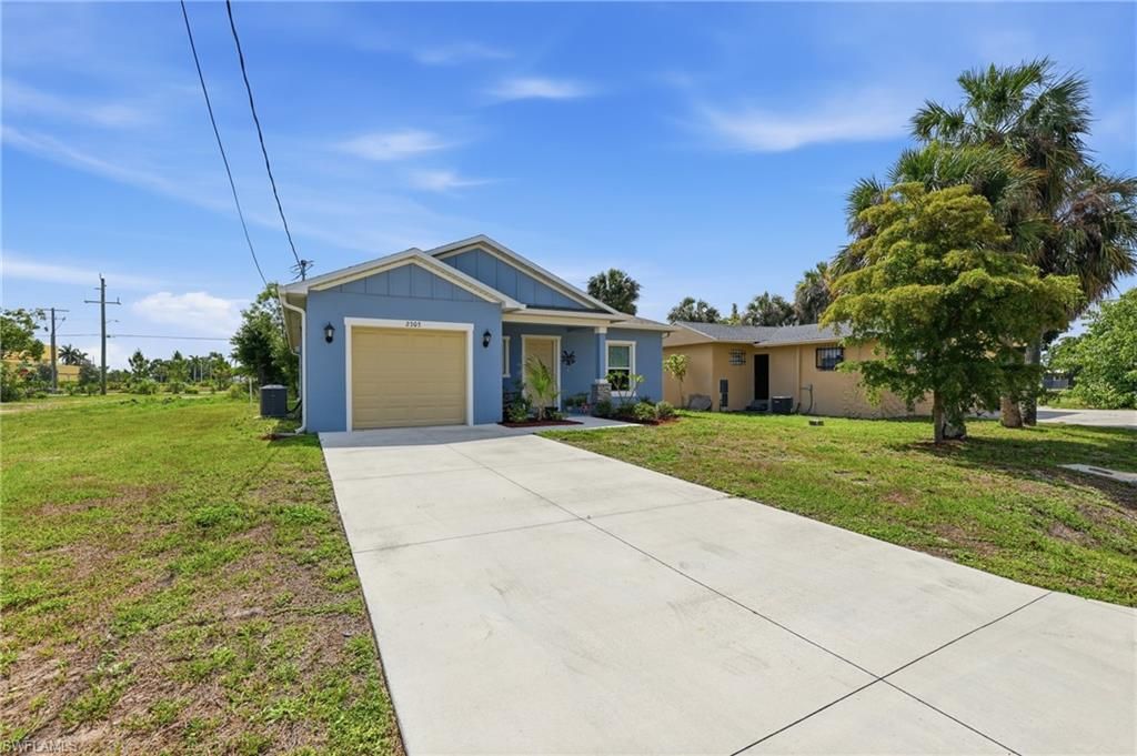 Photo of 2303 Ben ST S, FORT MYERS, FL 33916 (MLS # 226020760)