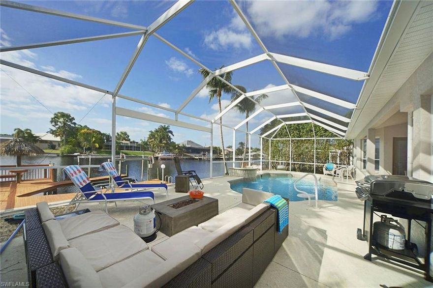 This is a VACATION RENTAL only. Owner will not consider an annual rental. Weekly rentals permitted. Villa Liza is a completely renovated 4-bedroom, 2.5-bathroom vacation rental home located in the coveted SW area of Cape Coral. Here, you are minutes away from Downtown Cape Coral, where there are plenty of restaurants, shopping, and bars with live music. The perfect location for the group who likes to be out and about!

Living Room: Enjoy your shows in the living room on the flat-screen TV while relaxing on the couch which serves as a queen sofa bed. Just beyond that are the large sliders that give you a panoramic view of the spacious lanai and canal.

Kitchen/Dining Room: To the left of the entrance is the formal dining room, which has seating for six. There is more seating available in the breakfast nook with room for four, and an additional three seats available at the kitchen island. The kitchen is fully equipped for all your cooking needs and features stainless steel appliances.

Master Bedroom/Bathroom: The master bedroom is off the living room and features a King-sized bed and flat-screen TV. The master bathroom is attached and includes both an oversized tub and a walk-in shower stall, and a double-sink vanity.

Guest Bedrooms/Bathrooms: As Villa Liza is a partial-split floor plan, two of the additional bedrooms are on the other side of the house off the kitchen area. The first guest room features a King-sized bed, flat-screen TV, and has its own slider with access to the lanai. The second guest room has a Queen-sized bed. The final guest room is a converted den and features two twin-sized beds and is located on the same side of the house as the master. All guest bedrooms share the second full bathroom that has a shower/tub combination.

Pool/Lanai/Dock: The most popular spot of the house will no doubt be the spacious lanai with the electric-heated pool. Whether you want to soak up the sun and work on your tan, float in the pool, or relax on the outdoor couch to enjoy good company, this space has something for everyone! Cook your dinners poolside with the available propane grill and eat your meals outside at the dining table with room for six. As the lanai faces west, you will be able to enjoy the beautiful sunsets that Florida has to offer fully. There is also a half-bath with access from the lanai if needed. There are 4 Bike Cruisers as well as a set of golf clubs for guest use.

Whatever you are looking for, Villa Liza will not disappoint. Don't wait until it's too late. Book your next trip to Villa Liza today!