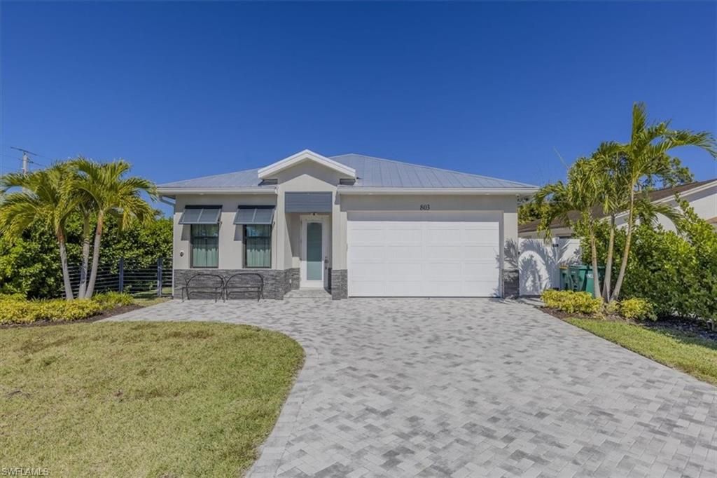 Photo of 803 92nd AVE N, NAPLES, FL 34108 (MLS # 226005026)
