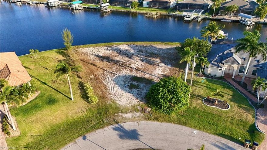 Embrace the allure of this exclusive NW Cape Coral gem – a stunning waterfront property with coveted GULF ACCESS and a NEWER SEAWALL already in place! Say goodbye to waiting lists and hefty checks for seawall installation – you can dive straight into your custom build dreams. Nestled along the picturesque "Bonefish Canal," this slice of paradise spans nearly 150 feet of waterfront, promising swift boat rides to waterfront dining and premier inshore fishing spots. In mere minutes, find yourself cruising through Matlacha Pass, a gateway to the enchanting islands of Sanibel, Captiva, Cayo Costa, Boca Grande, and the expansive, azure expanse of the Gulf of Mexico. Here, indulge in the quintessential Florida lifestyle – a harmonious blend of boating, fishing, and vibrant coastal living, all crowned by breathtaking sunsets. In the city of Cape Coral, discover over 400 miles of navigable canals, seamlessly interconnected to offer unparalleled Gulf access. Also, Conveniently situated just 30 miles from RSW International Airport and 21 miles from Punta Gorda Airport, Cape Coral epitomizes accessibility. Within arm's reach, enjoy an array of dining options, shopping destinations, grocery stores, medical facilities, and anticipate the forthcoming excitement of The Seven Islands, a multi-venue development on the horizon. But the allure of Cape Coral extends beyond its idyllic waterways – it's a vibrant community pulsating with activity. From eclectic festivals to bustling farmers markets, live music soirées to the renowned Bike Night, the city exudes an energetic charm. Immerse yourself in local culture with visits to breweries, including the esteemed Wicked Dolphin Distillery, or unwind at the Cape Coral Yacht & Beach Club. Sports enthusiasts will delight in the city's expansive sports complex and the challenging greens of the Arthur Hills-designed Coral Oaks Golf Course.
For family fun, dive into the thrills of Sun Splash Waterpark or embark on an adventure at Gator Mike's Family Fun Park. With Cape Coral, the possibilities are endless – come, experience the dynamic tapestry of life in Southwest Florida.