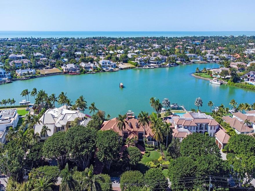 Boaters paradise! Enjoy outstanding panoramic wide water views with 153 ft. of water frontage.Western exposure for beautiful sunsets. This exceptionally well maintained property is perfect for entertaining. The open floor plan encompasses multiple living areas that flow seamlessly from the indoor space to the expansive outdoor living areas including lanai with a retractable screen and gorgeous resort style pool. This custom residence is ready for your design and finishing touches to create your dream home. This desirable property is finished with a pristine dock with boat lift and jet ski lift. Ideally located in prestigious Port Royal in just minutes from 3rd Street South’s and 5th Avenue South's fine dining, world-class shopping and white-sand beaches. Port Royal Club membership eligibility.