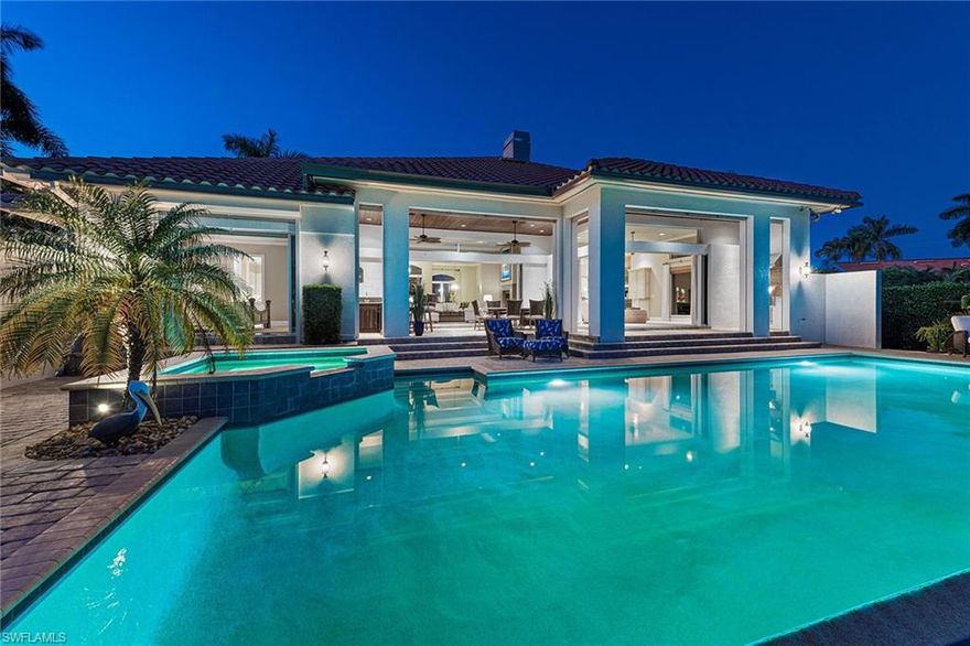 Immaculate split floor plan, “smart home” with spectacular wide-water views has everything. Residence was built by Coleman Homes and updated in 2008 with complete storm protection, including a whole house generator. Home features a gas fireplace, high ceilings, chef's kitchen with top-of-the-line appliances, 5-burner gas stove, wine cooler, oversized refrigerator and an abundance of counter space. Entertaining has never been easier with expansive outdoor living space including a 42-foot saltwater infinity edge pool/spa with new pool pump and lighting, updated in 2019. A 16,000-pound boat lift and 40-foot dock provide direct water access. Smart home automation allows remote access and control of all systems, including pool & spa controls, cameras, lighting, cooling/heating, water heater, automatic water shut-off, security system, door locks, water fountain and smart (weather aware) irrigation. 3 new high-efficiency A/C units, new ductwork and new, high-efficiency hybrid water heater installed in 2019. Whole house water filtering and insurance approved water leak monitoring system installed in 2020. Residence is finished with an air-conditioned garage with workbench and storage area.