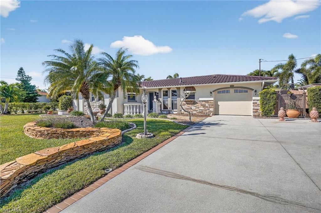 Photo of 5266 Wisteria CT, CAPE CORAL, FL 33904 (MLS # 226005338)